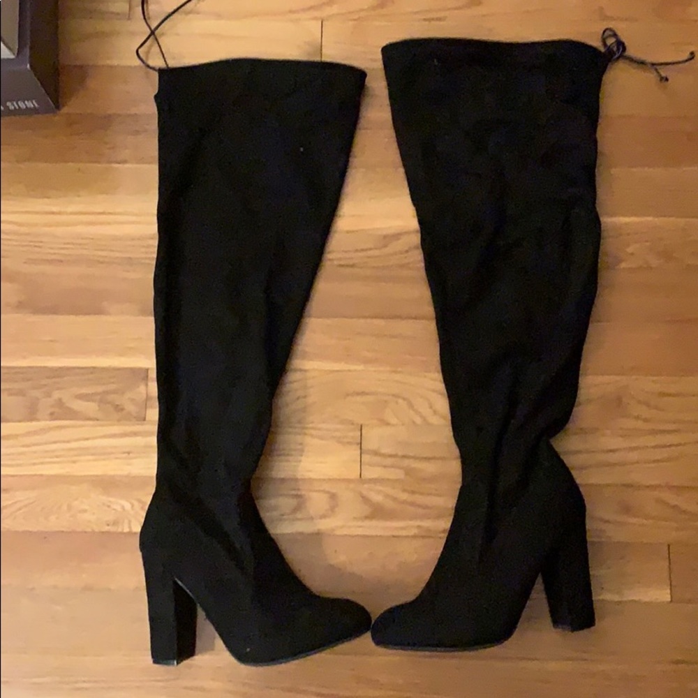 Knee high heeled boots